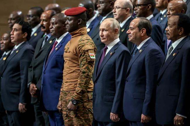 Russia's Vladimir Putin (C) surrounded by African leaders at the Saint Petersbourg summit this week