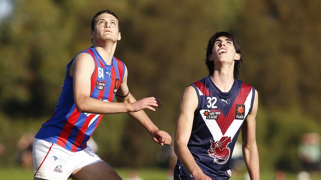 The Dragons’ Dante Visentini in a ruck contest with Edward Moyle of the Chargers.