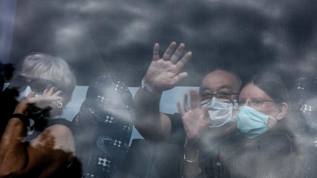 Passengers evacuated from the cruiseship Diamond Princess are driven to a quarantine facility near Darwin. Picture: Glenn Campbell