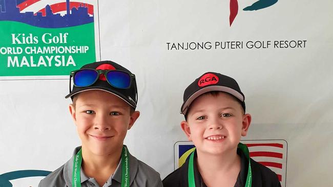 Rockhampton&#39;s Riley Milliner and Eli Parsons at the US Kids Golf World Championships in Malaysia. Picture: CONTRIBUTED