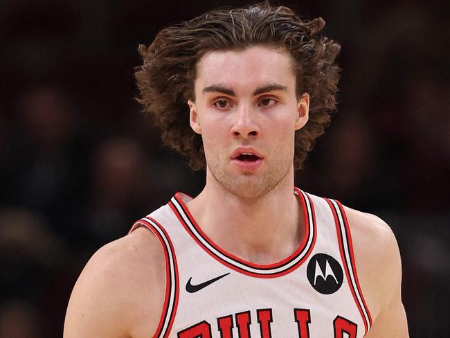 CHICAGO, ILLINOIS - DECEMBER 02: Josh Giddey #3 of the Chicago Bulls dribbles up the court against the Brooklyn Nets during the second half at the United Center on December 02, 2024 in Chicago, Illinois. NOTE TO USER: User expressly acknowledges and agrees that, by downloading and or using this photograph, User is consenting to the terms and conditions of the Getty Images License Agreement.   Michael Reaves/Getty Images/AFP (Photo by Michael Reaves / GETTY IMAGES NORTH AMERICA / Getty Images via AFP)