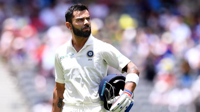 Indian batsman Virat Kohli leaves the field after being dismissed on day three. Picture: AAP