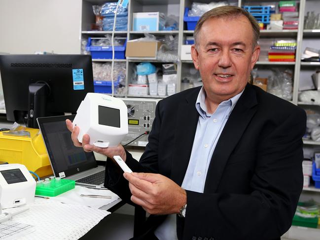 AnteoTech CEO Derek Thomson pictured in one of the labs and with the newly approved Covid testing machine about to be sold to Europe, Eight Mile Plains Monday 12th April 2021 Picture David Clark