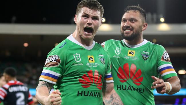 SYDNEY, AUSTRALIA - OCTOBER 09:  John Bateman of the Raiders and Jordan Rapana of the Raiders celebrate winning the NRL Semi Final match between the Sydney Roosters and the Canberra Raiders at the Sydney Cricket Ground on October 09, 2020 in Sydney, Australia. (Photo by Cameron Spencer/Getty Images)