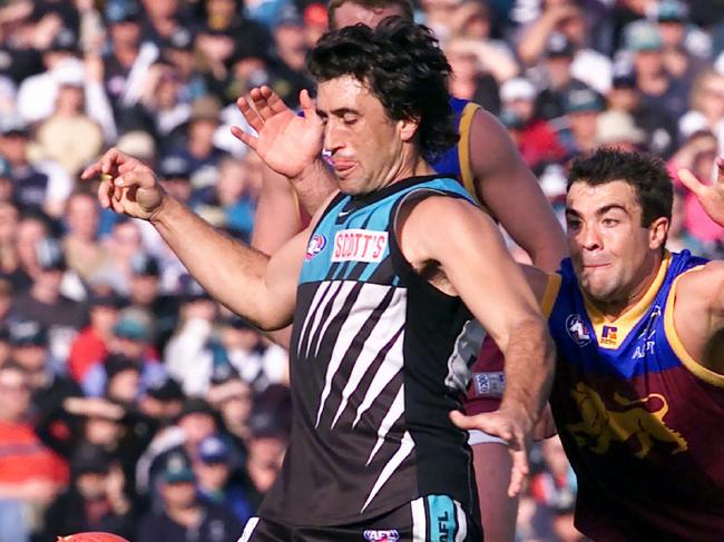 D/IFootballer Roger James (l) wtih Chris Scott (r).AFL football - Port Adelaide Power vs Brisbane Lions match at AAMI Stadium 31 Aug 2002. a/ct/Football/AFL