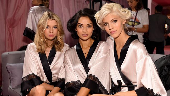 Angelic trio ... Aussie beauty Shanina Shaik (centre) with fellow models Stella Maxwell and Devon Windsor. Picture:  by Dimitrios Kambouris/Getty Images for Victoria's Secret