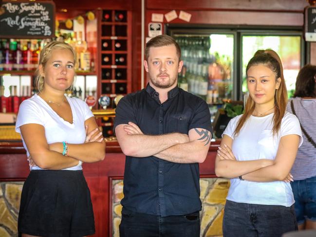 Deck Bar hospitality workers From L Sophie Hampton, Derek Duffy and Evelyn Tran  fed up with a lack of certainty for their industry.Picture: Glenn Campbell