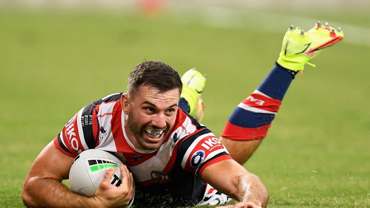 TOWNSVILLE, AUSTRALIA - SEPTEMBER 11: James Tedesco of the Roosters scores a try during the NRL Elimination Final match between Sydney Roosters and Gold Coast Titans at QCB Stadium, on September 11, 2021, in Townsville, Australia. (Photo by Ian Hitchcock/Getty Images)