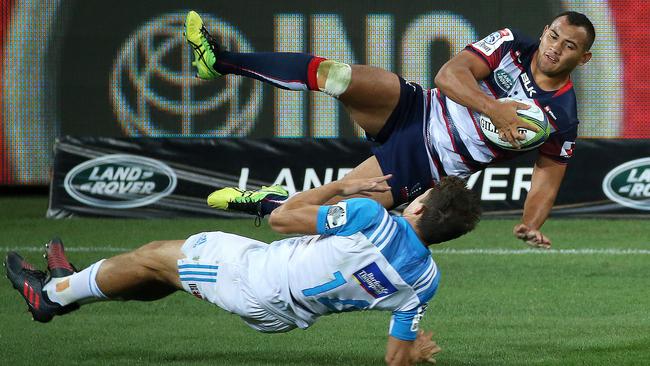 Super Rugby : Melbourne Rebels V Auckland Blues at AAMI Park, 23rd February, Melbourne Australia. Jonah Placid of the Melbourne Rebels crash's into Matt Duffie of the Auckland Blues. Picture : George Salpigtidis