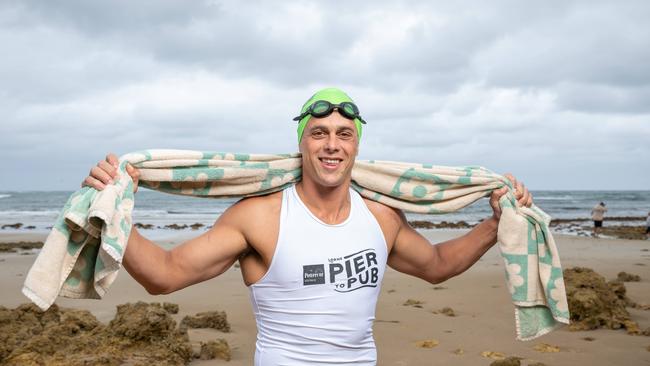 06-01-2025 Ex Carlton star Ed Curnow swimming this years Lorne Pier to Pub. Picture: Brad Fleet