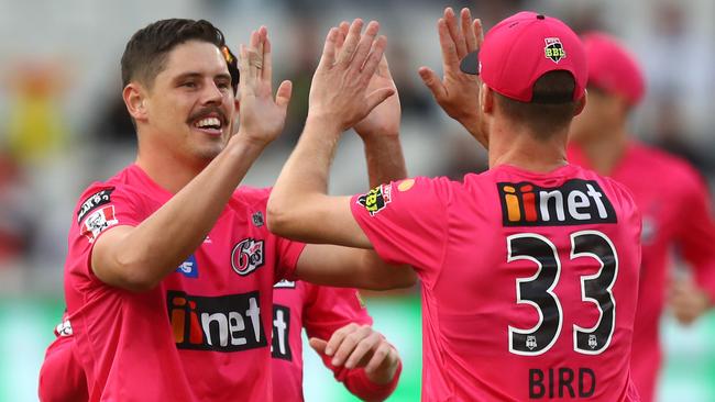 Ben Dwarshuis of the Sixers celebrates after dismissing Marcus Stoinis of the Stars during their Big Bash League match at the Melbourne Cricket Ground on Australia Day. Picture: Getty Images