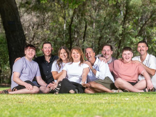 Tanya Miles is back home in Australia with her family after surgery on a deadly brain tumour in China with Dr Charlie Teo. Pictured witth her family from left, Jonah, Ryan, Averil, Tanya, husband Damien, Noah, Sheldon and Finlay. Picture Rob Leeson.