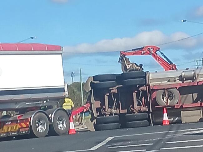 A semi-truck rollover caused traffic delays at a busy Warwick intersection on Friday morning. Photo: Ebony-Beth Baldry