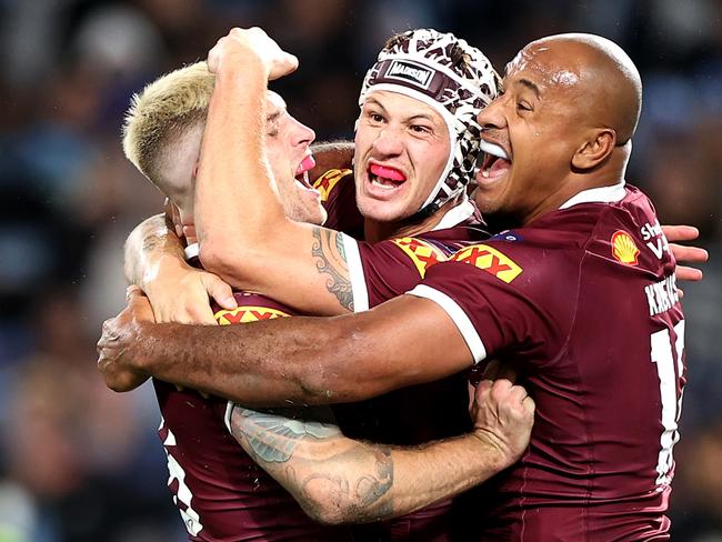 *2022 Pictures of the Year Australia* - SYDNEY, AUSTRALIA - JUNE 08: (L-R) Cameron Munster, Kalyn Ponga and Felise Kaufusi of the Maroons celebrate victory at full-time during game one of the 2022 State of Origin series between the New South Wales Blues and the Queensland Maroons at Accor Stadium on June 08, 2022, in Sydney, Australia. (Photo by Mark Kolbe/Getty Images)