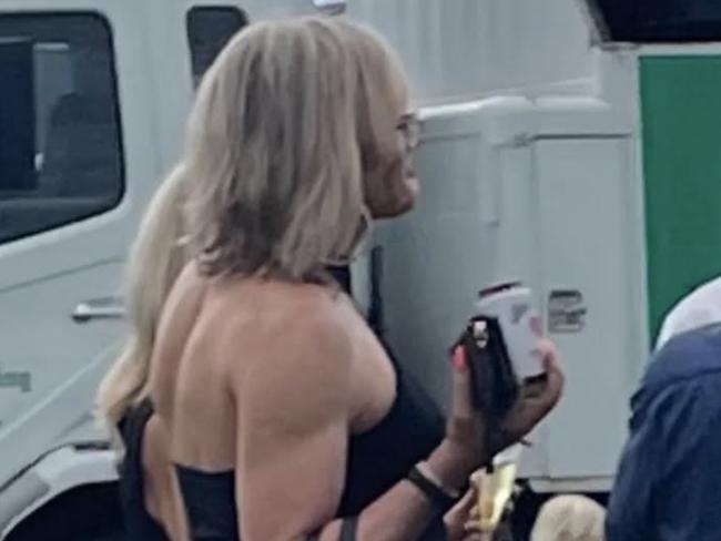 Covertly snapped pictures of former AFL coach Dani Laidley at Geelong Racecourse at the weekend have surfaced online.Ms Laidley was photographed at the Ballan Cup on Saturday as she spoke with friends, including former North Melbourne captain Anthony Stevens.