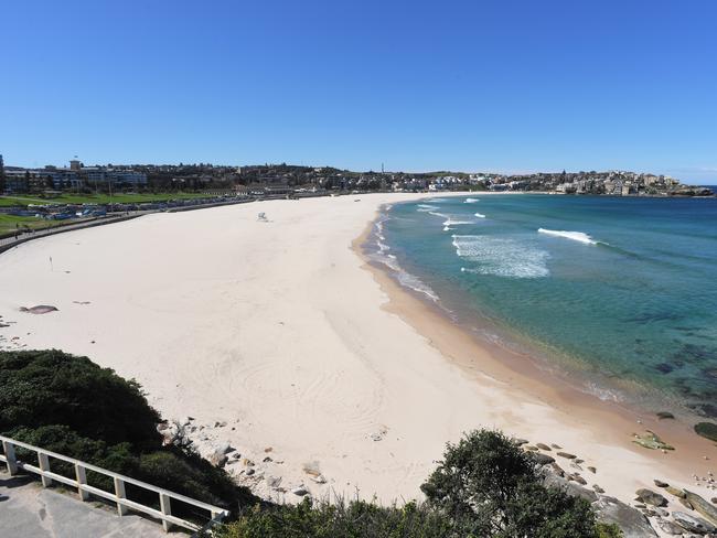 An unusual sight, a deserted Bondi Beach. Picture: AAP/Simon Bullard