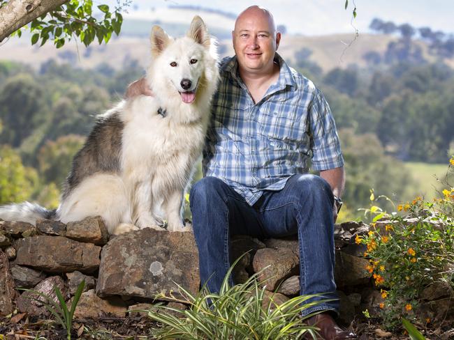 Matt Good developed severe PTSD after working as an army investigator. He says his service dog Ulric can sense his anxiety and get him out of potentially dangerous situations. Picture: Sarah Matray