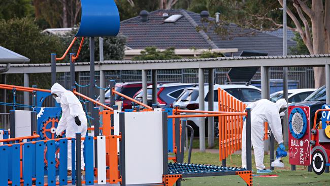 Werrington Public School being professionally cleaned by workers in Hazmat outfits. Photo: Adam Yip