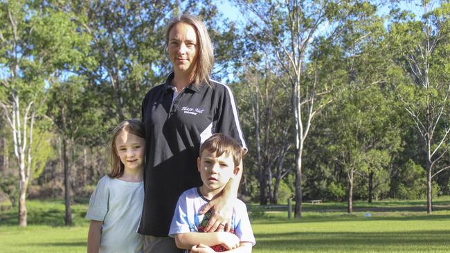 Jo Baker and her children Madalyn and Jack at the Blaze Aid camp in Nymboida.