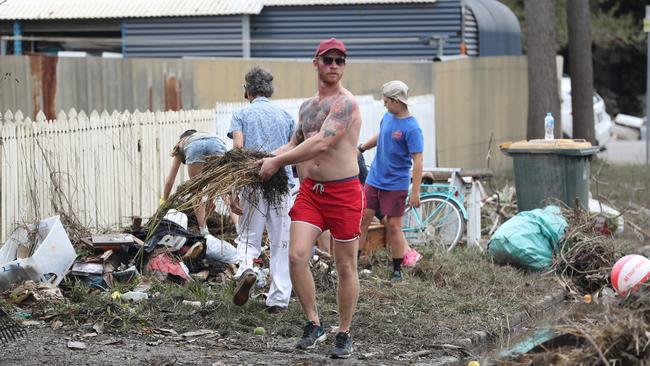 Cleaning up in Vincent St, Auchenflower. Picture: Annette Dew