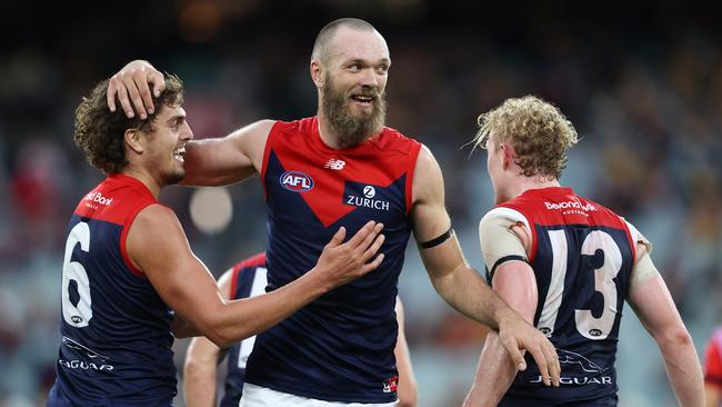 Max Gawn enjoys a goal with teammates Clayton Oliver and Luke Jackson. Picture: Michael Klein.