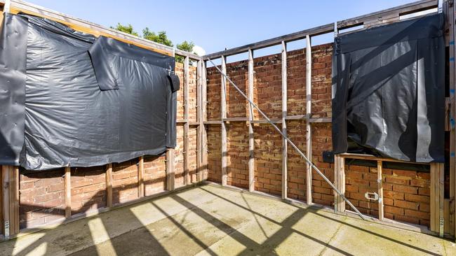 This Lidcombe house, which burnt in a fire started by a faulty airconditioning unit, attracted a bidding war when it went under the hammer in July.