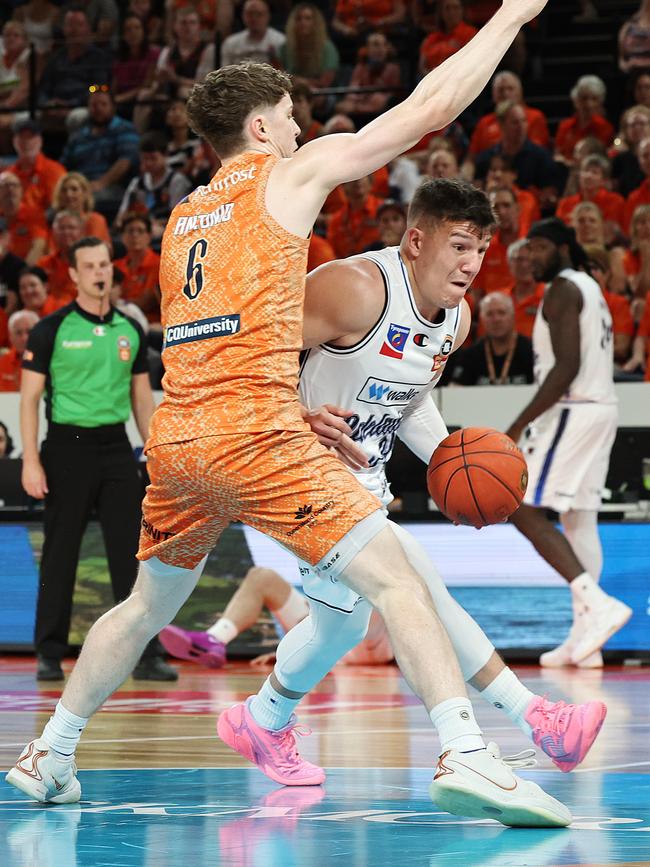 Adelaide's Dejan Vasiljevic drives past Jonah Antonio in the National Basketball League (NBL) match between the Cairns Taipans and the Adelaide 36ers, held at the Cairns Convention Centre. Picture: Brendan Radke