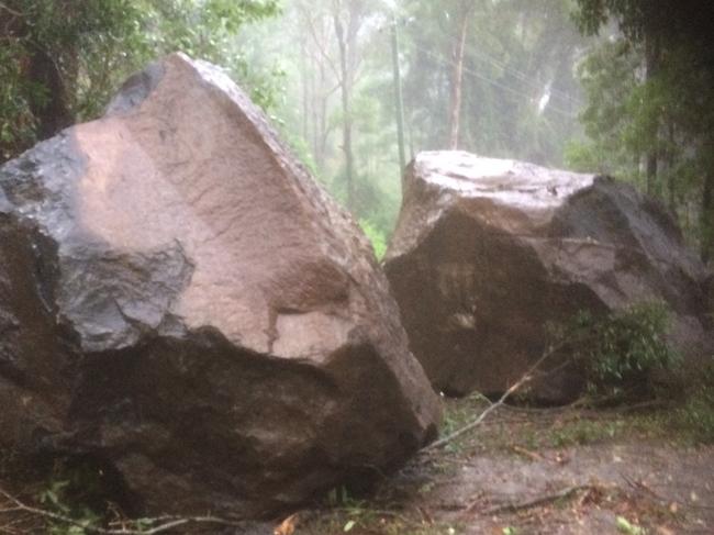 Police photos of Tamborine Mountain Road at Mount Tamborine is closed after a serious landslide during extreme weather on the Gold Coast. Photo: QLD Police