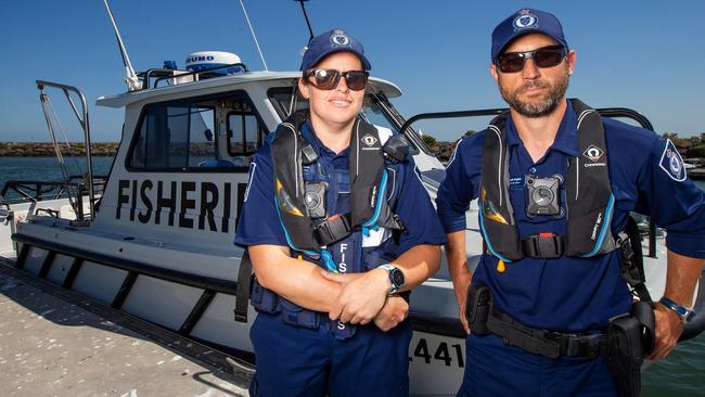 Victorian Fisheries Authority Officers Sarah and Mark have caught people hiding illegally caught fish in their bras and underpants to avoid detection. Picture: Mark Stewart