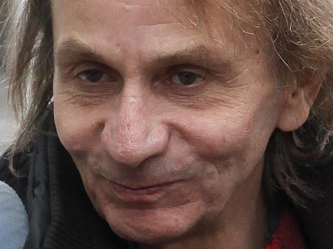 FOR STORY SLUGGED EU BOOKS HOULLEBECQ SUBMISSION BY GREG KELLER - This Wednesday, Jan. 7, 2015 photo shows French novelist Michel Houellebecq after an interview on radio station France Inter, in Paris. The latest novel by Michel Houellebecq, the bad boy of French letters, has been called everything from an Islamophobic rant to a “French literary suicide.” Imagining the election of a Muslim president in France, “Submission” struck a raw nerve when it came out this year on the same day as the Charlie Hebdo attacks in Paris. (AP Photo/Thibault Camus)