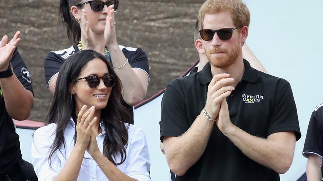 The world first saw US actress Meghan Markle with Prince Harry at the Invictus Games in 2017 during the early days of their relationship. Picture: Chris Jackson/AFP