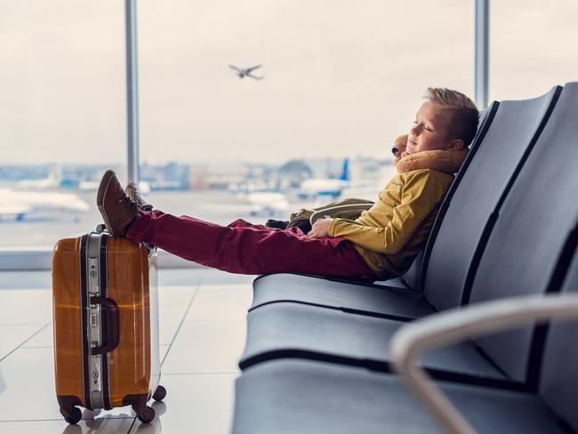 How to sleep on a plane: Best position for reclining | escape.com.au