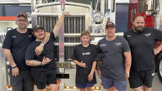 Weir Views Land Transports' Ben Land, Brock Land, JD Land, 'Big Ed' Bethierry and Daniel Oldfield with one of their huge semi trailers they put on display at Meatstock 2023.