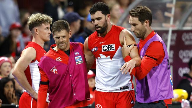 Paddy McCartin leaves the field after a head knock against the Power in Round 4. Picture: Phil Hillyard