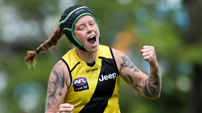 Tayla Stahl s celebrates a goal during their recrnt practice game.