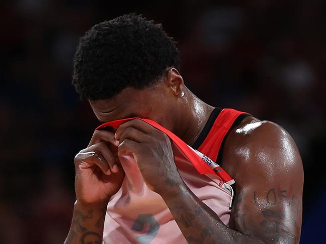 Perth’s Kristian Doolittle takes a moment after copping a head knock. Photo: Getty