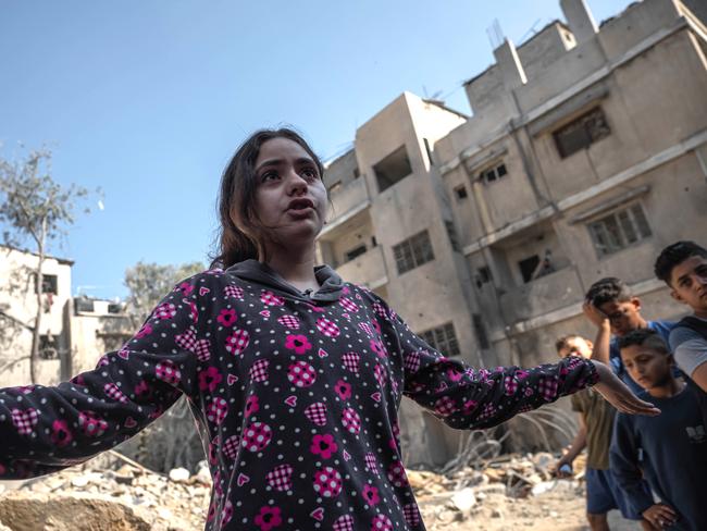 Palestinians inspect the Abo Hatab family's house after an Israeli air strike reportedly struck their house in al-Shati Refugee Camp west of Gaza City. Picture: Fatima Shbair/Getty Images)