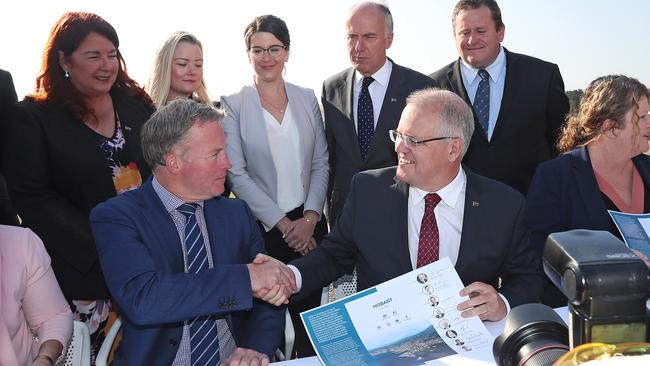 Premier Will Hodgman and Prime Minister Scott Morrison at the signing of the Hobart City Deal at Hobart Airport. Picture: LUKE BOWDEN