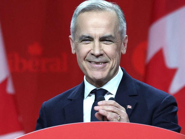 Canada's Liberal Leader and Prime Minister-elect Mark Carney speaks after being elected as the new Liberal Party leader, in Ottawa on March 9, 2025. Canada's Liberal Party overwhelmingly elected Mark Carney as its new leader and the country's next prime minister on March 9, 2025, tasking the former central banker with helming Ottawa's response to threats from US President Donald Trump. (Photo by Dave Chan / AFP)