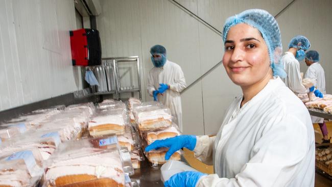 NETWORK SPECIAL.  MUST TALK WITH NETWORK PIC DESK BEFORE PUBLISHING.      Laila Matto is labelling the Cream Ice Finger packaging. Homestyle Bake Toowoomba. Has developed an energy efficient operation. 29th November 20204,; pic David Martinelli