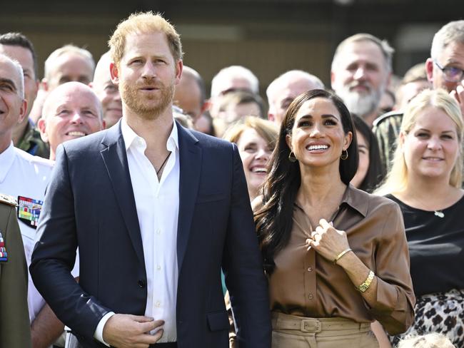 DUESSELDORF, GERMANY - SEPTEMBER 14: Prince Harry, Duke of Sussex and Meghan, Duchess of Sussex meet with NATO Joint Force Command and families from Italy and Netherlands during day five of the Invictus Games DÃÂ¼sseldorf 2023 on September 14, 2023 in Duesseldorf, Germany. (Photo by Sascha Schuermann/Getty Images for the Invictus Games Foundation)