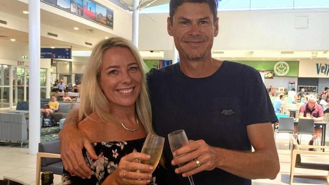 RELAXED: Dave and Richelle Wright calm their Melbourne Cup nerves with a champagne at Sunshine Coast Airport. Picture: Contributed