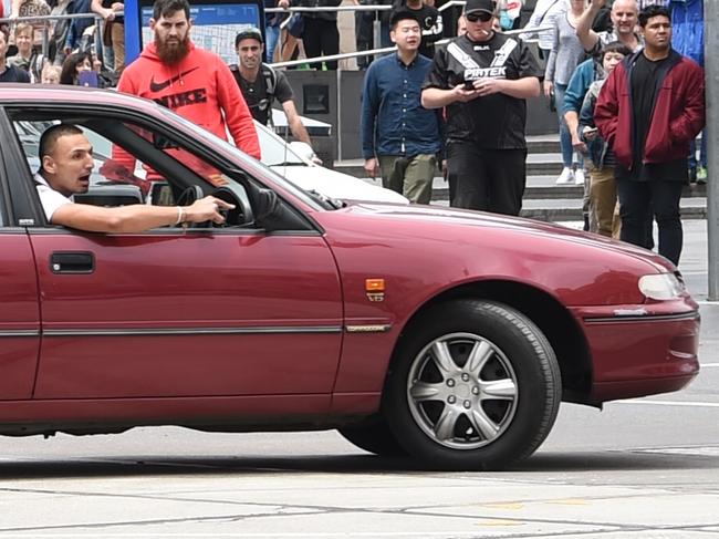 Driver the drove his car up Swanston st and then collected pedestrians down Bourke St, Melbourne. Picture, Tony Gough