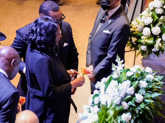 RowVaughn Wells stops in front of the casket of her son Tyre Nichols at the start of his funeral service at Mississippi Boulevard Christian Church in Memphis, Tennessee, on February 1, 2023. - Nichols, 29, was stopped on January 7, 2023, for what the Memphis Police Department said was reckless driving. After a chase ensued, "police brutalized him to the point of being unrecognizable," family attorneys Ben Crump and Antonio Romanucci said in a statement. Nichols was taken to hospital in critical condition, according to police, where he died on January 10, 2023. (Photo by POOL / AFP)