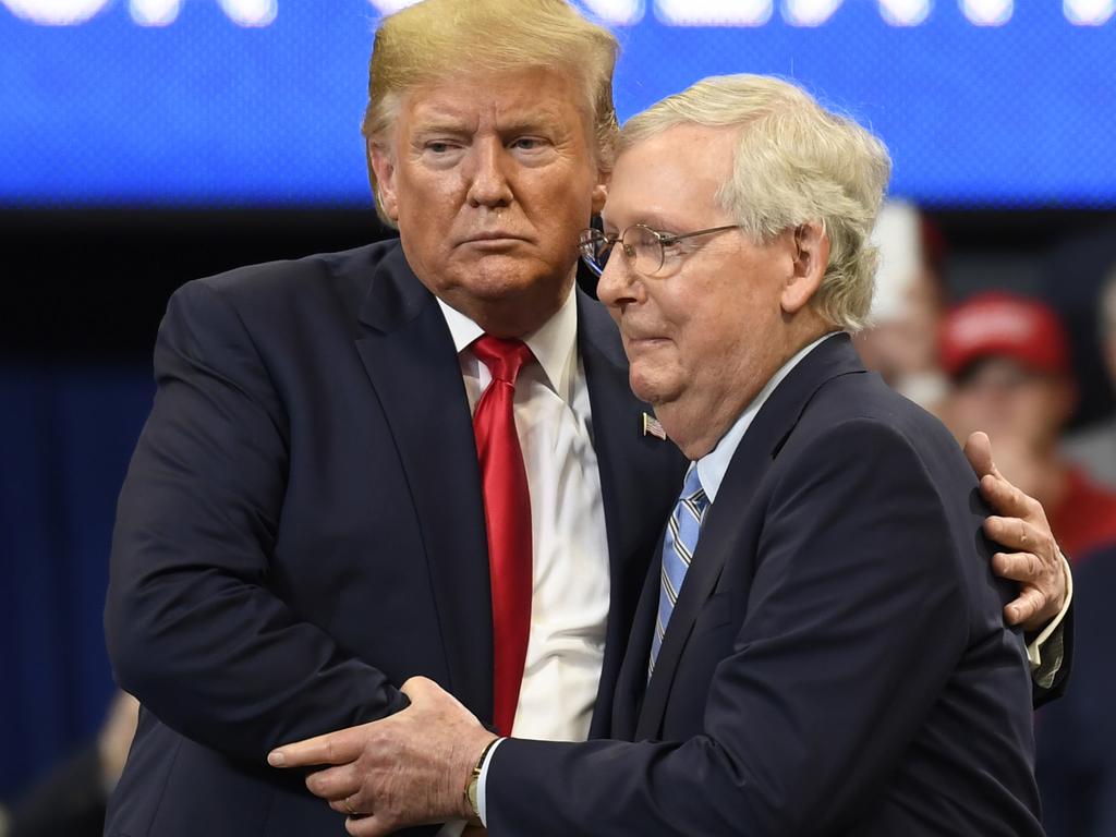 US President Donald Trump, left, hugs Senate Majority Leader Mitch McConnell of Kentucky. Picture: AP