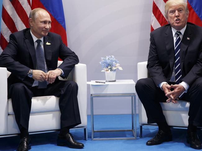 Putin and US President Donald Trump pictured on the sidelines of the G20 last July. Picture: Evan Vucci/AP