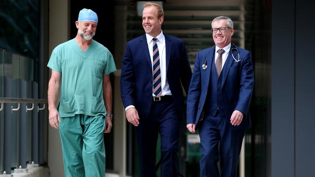 Mr Burton, pictured with Dr Greenwood and Professor Toby Coates, will apply his knowledge as a burns patient and charity founder to the biotech company. Picture: Calum Robertson