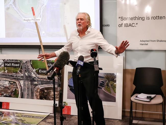 John Woodman waved a wooden ruler at the screen during his monologue. Picture: Ian Currie