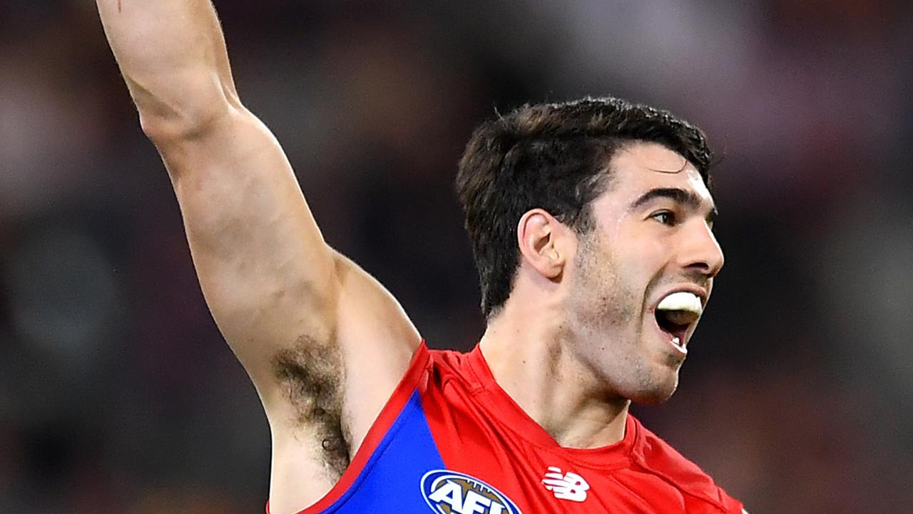 Christian Petracca celebrates a goal.