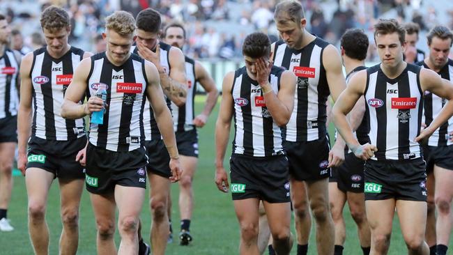 Collingwood players leave the ground after loss to Geelong. Picture: Alex Coppel